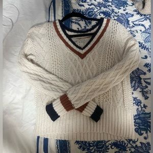 White sweater with trim